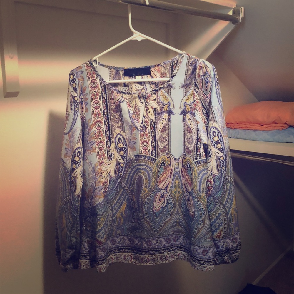 Women’s Blouse with Whimsical Designs Throughout.
